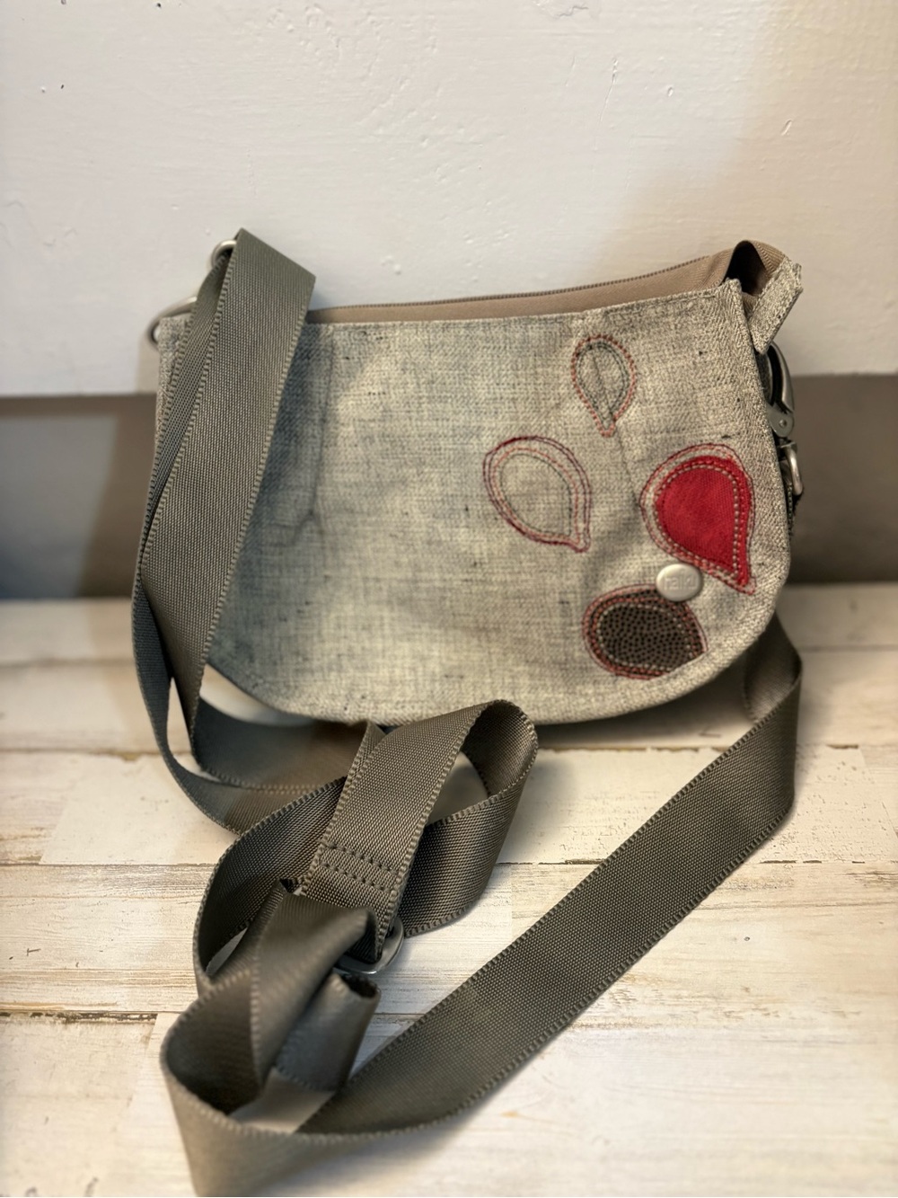 Haiku Gray Crossbody with Red Teardrop Accent